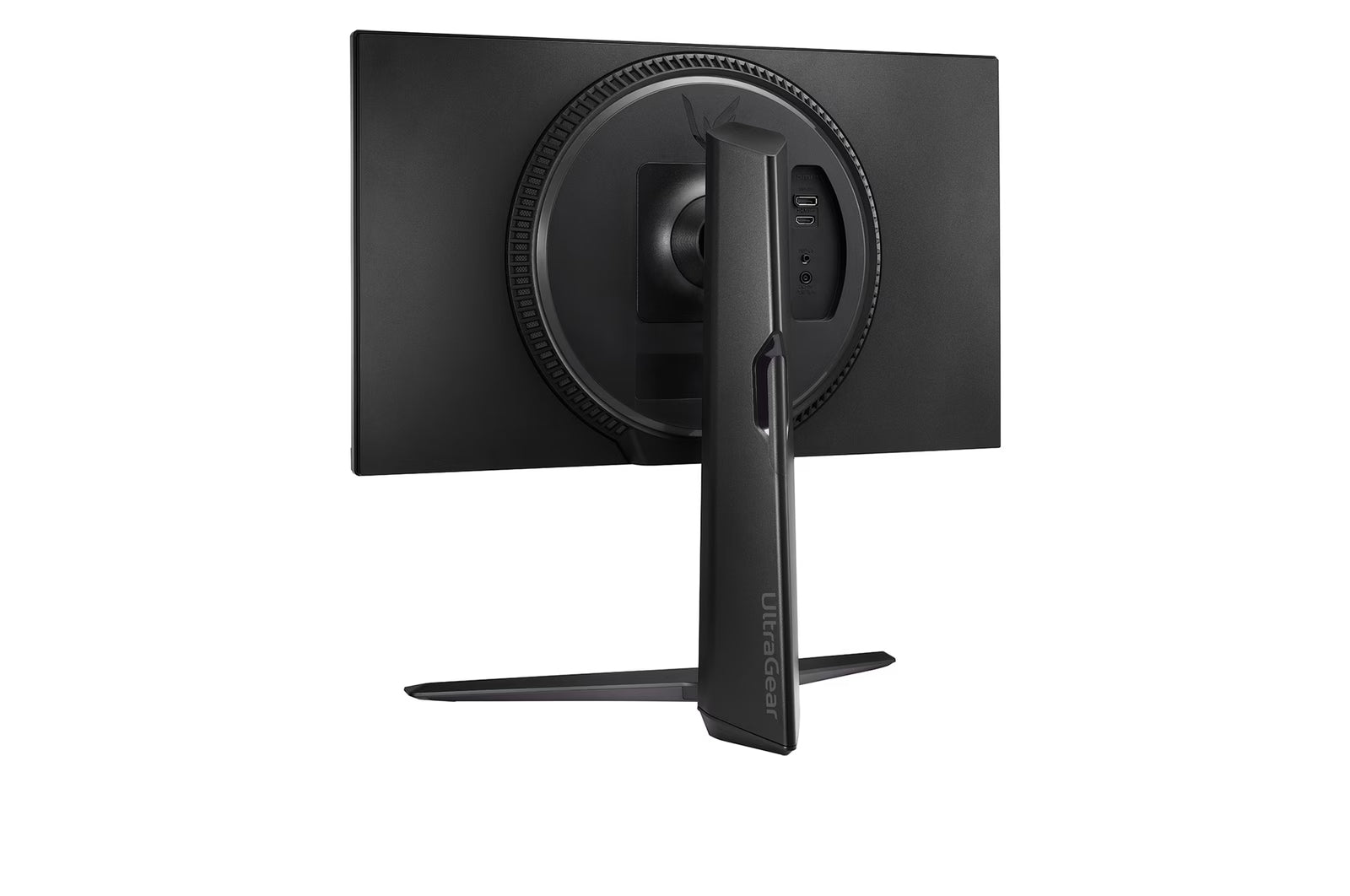 LG 24GS65F Monitor hátulnézetben enyhén balra fordítva, talpon.