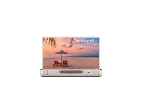LG 27LX5QKNA monitor előlnézetben. A kijelzőn lg standbyme go logó és tengerpart.