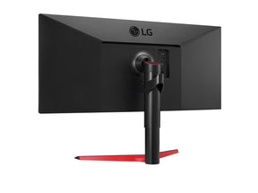 LG 34WP65G-B Monitor hátulnézetben enyhén balra fordítva, talpon.