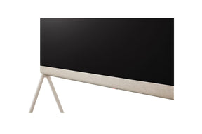 LG 48LX1 OLED televízió talpa és alsó textillel bevont kávája közelről.
