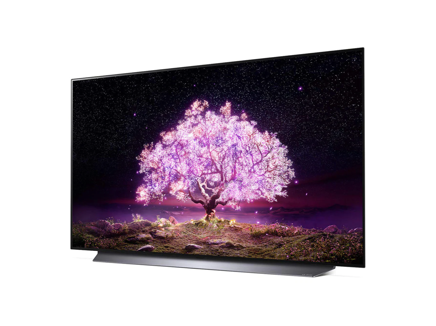 LG 55C1 OLED televízió előlnézetben enyhén balra fordítva talpon, a kijelzőn csillagos égbolt és rózsaszínben világító fa.