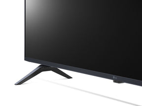 LG 65UP8000 4K Smart TV talpra közelítve. 