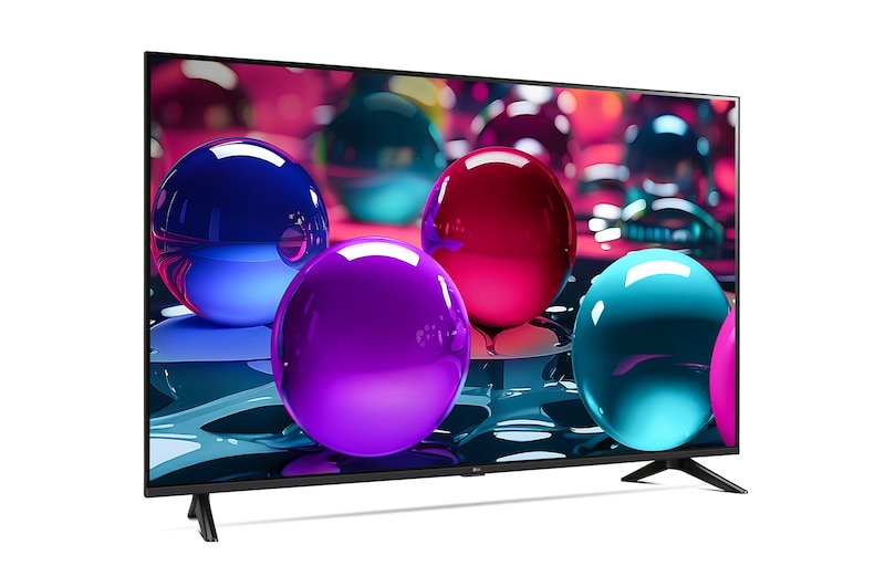 LG UA7300 szériás Smart televízió előlnézetben talpon, enyhén jobbra fordítva. A kijelzőn kék, piros és lila gömbök.